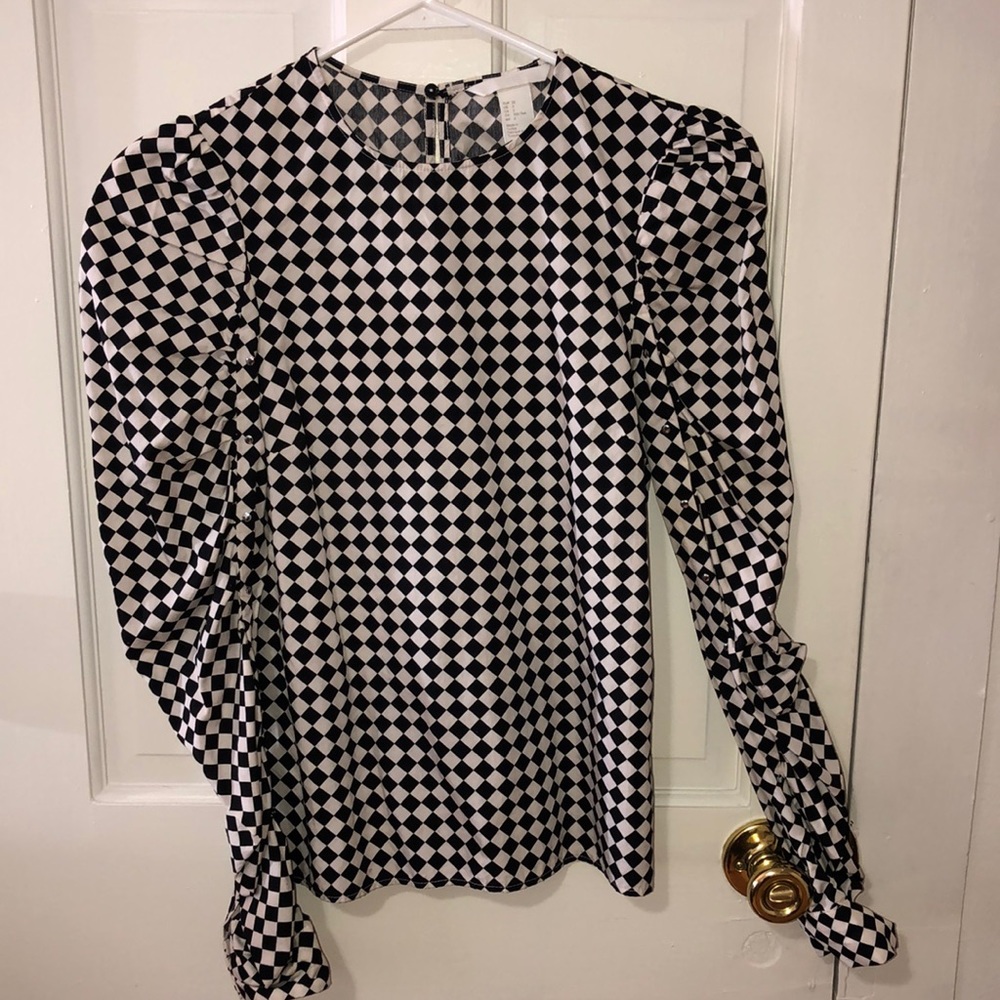 Checkered print with studs on arm sleeve